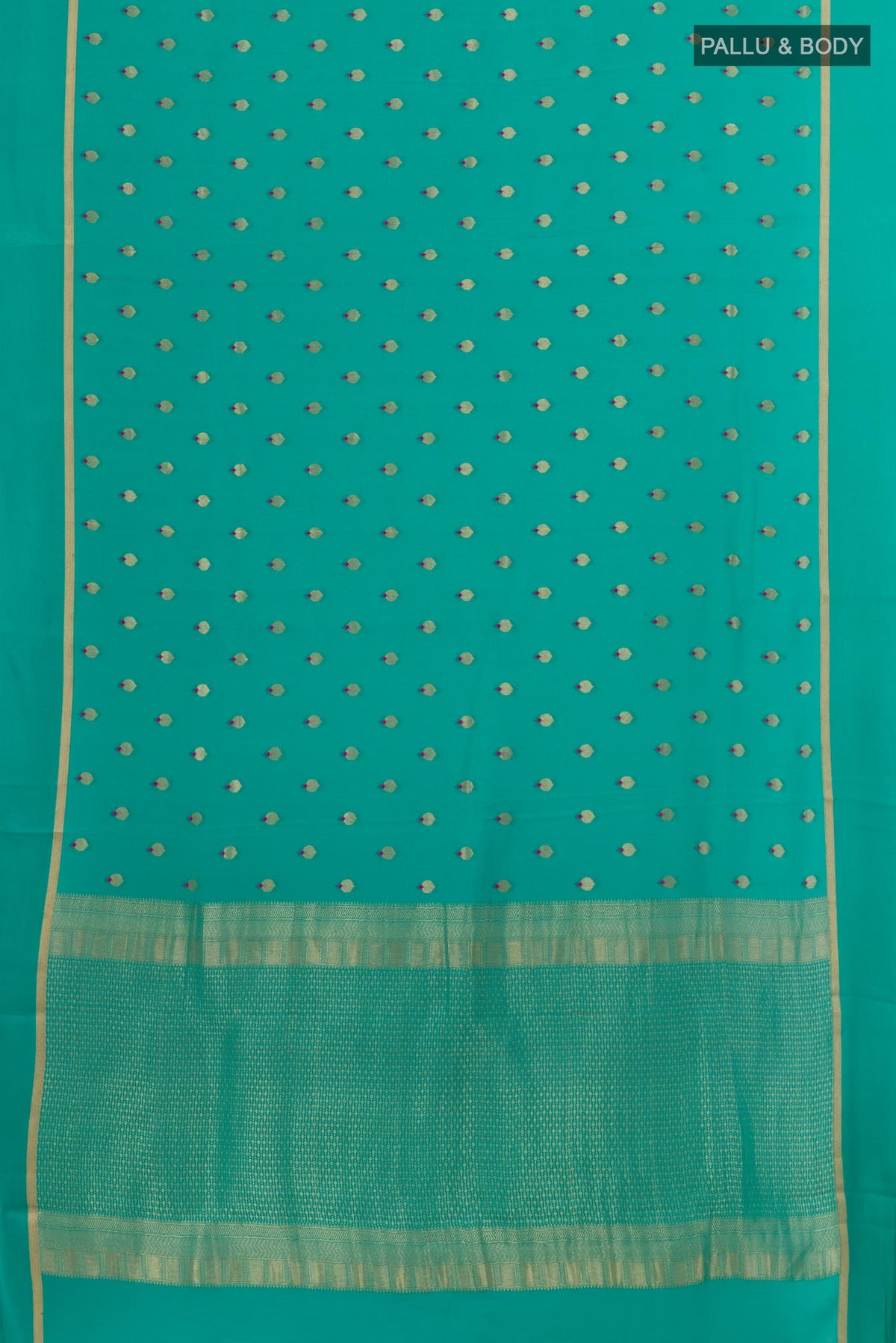 Flat view of Sea Green Mysore Crepe Saree with Zari Butta on the body and Zari Border. 