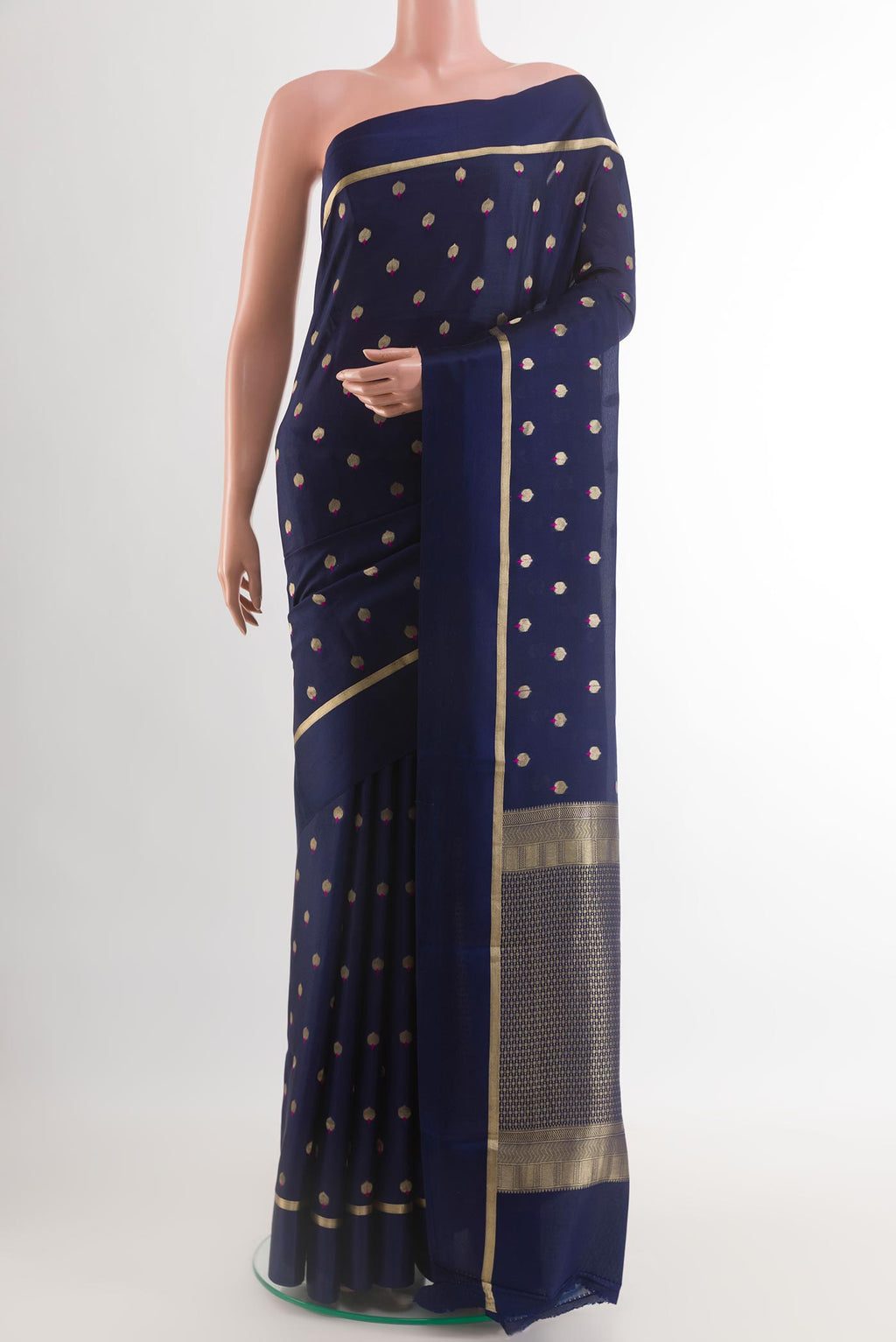 Blue Mysore Crepe Saree with Zari Butta on the body and Zari Border.  displayed on a mannequin