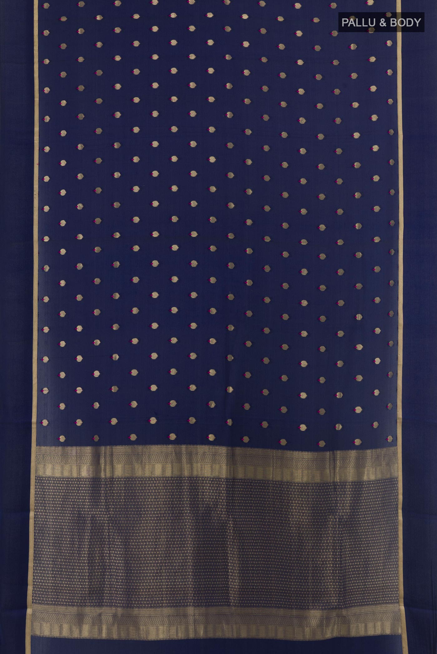 Flat view of Blue Mysore Crepe Saree with Zari Butta on the body and Zari Border. 