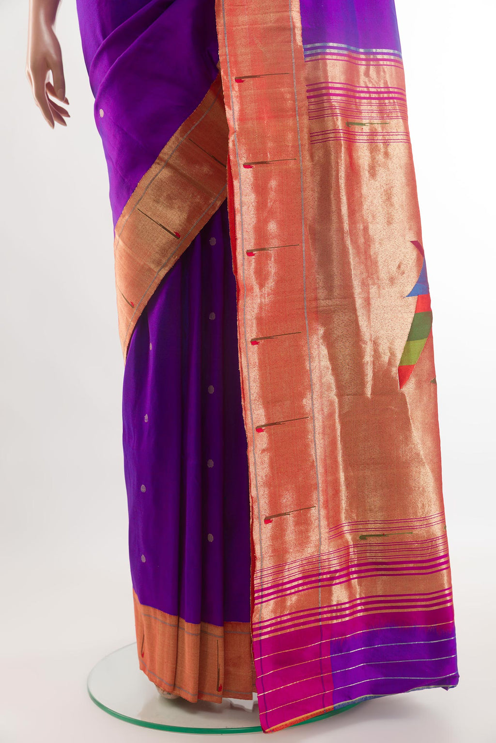 Pleats and pallu of Purple Paithani Silk Saree with Zari Butta on the body and Paithani Border. 