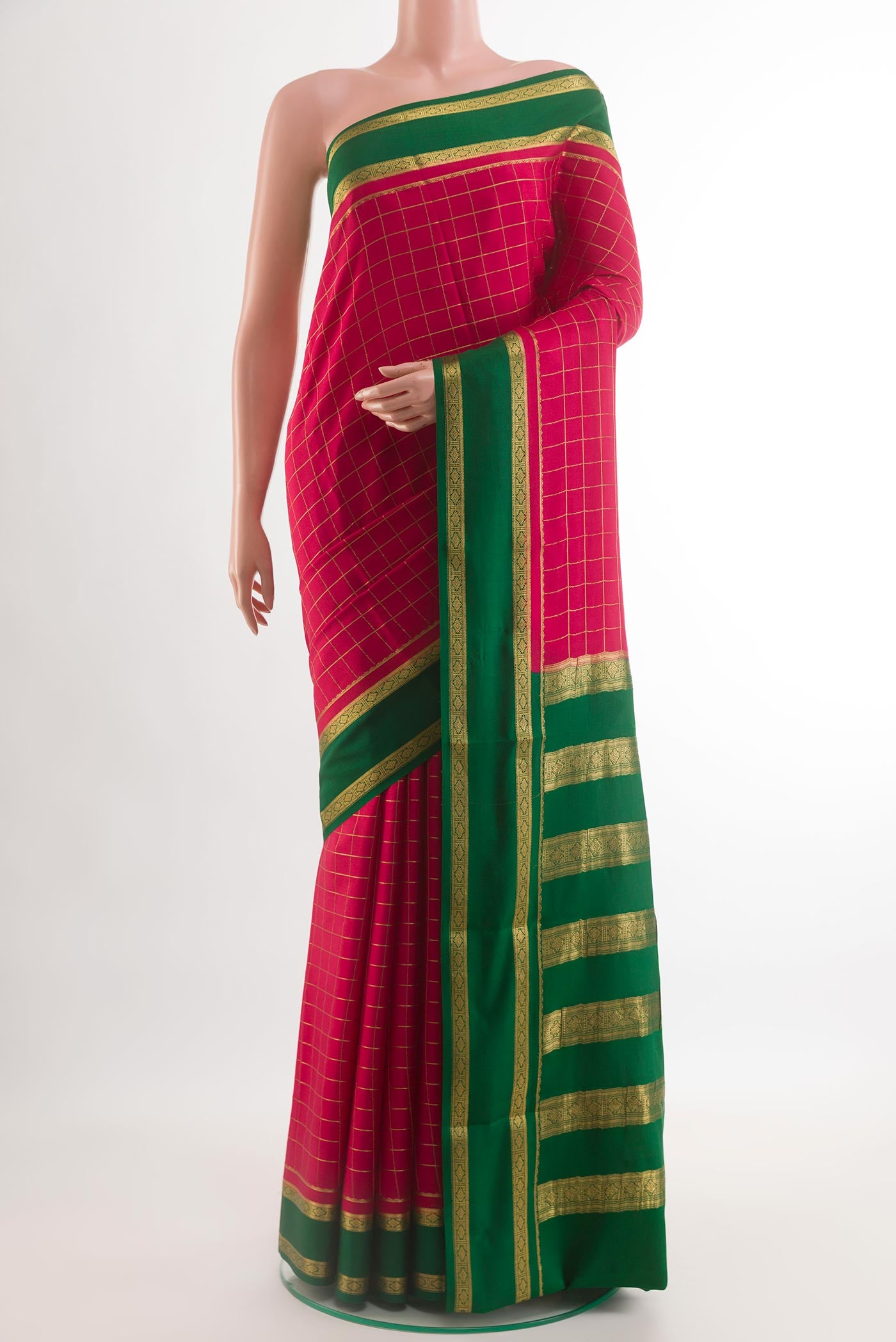 Pink Mysore Crepe Saree with Checked design on the body and Zari Border.  displayed on a mannequin