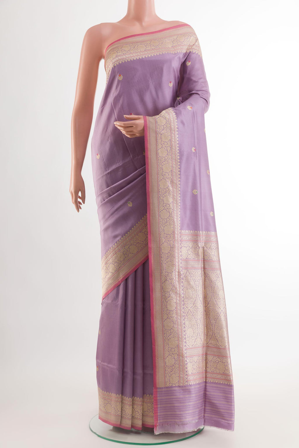 Lavender Banarasi Silk Saree with Zari Butta on the body and Zari Border.  displayed on a mannequin