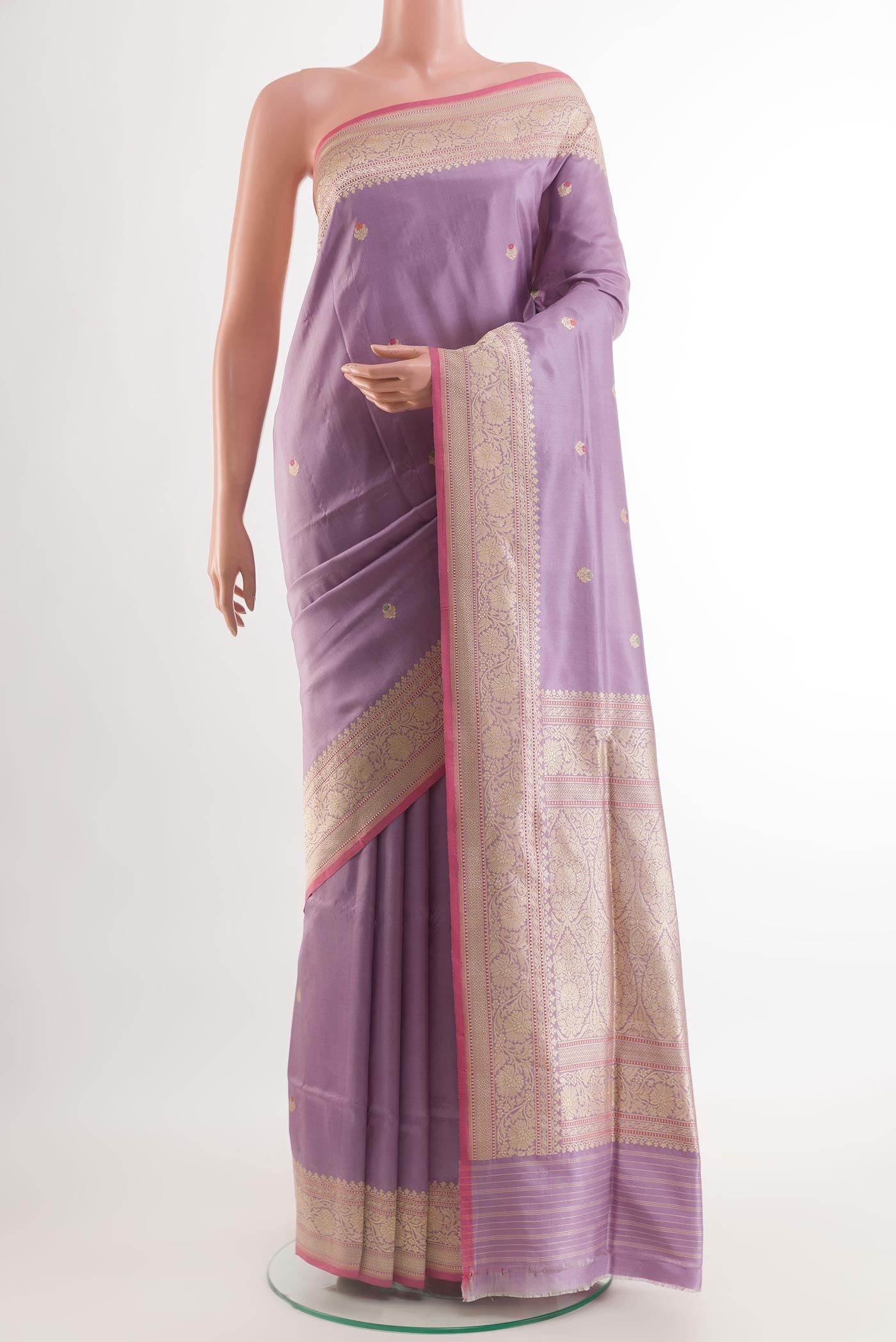 Lavender Banarasi Silk Saree with Zari Butta on the body and Zari Border.  displayed on a mannequin