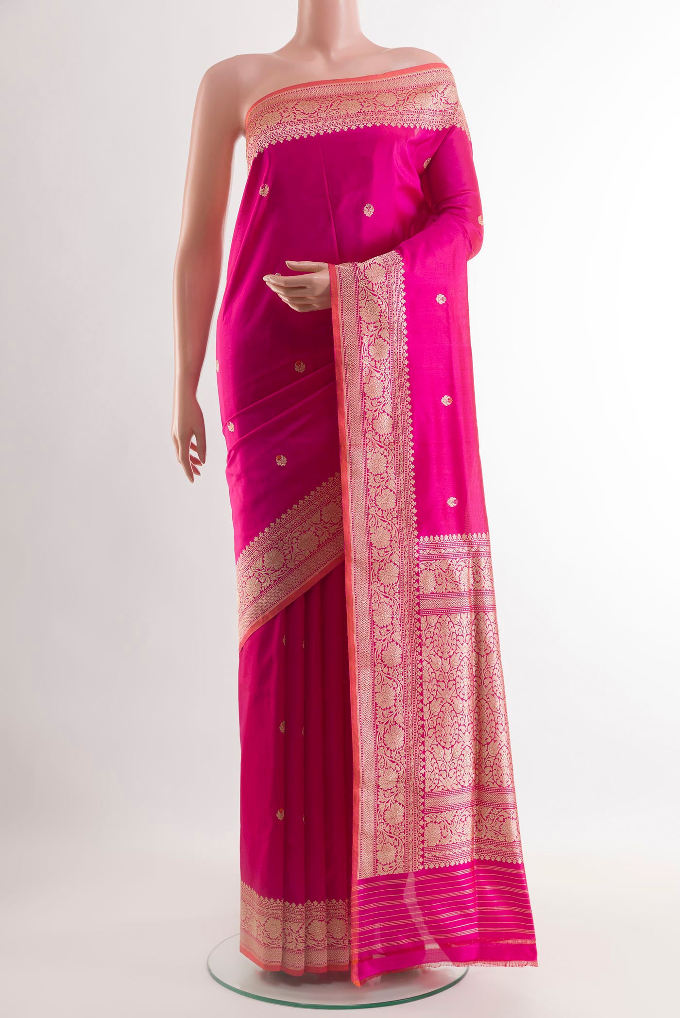 Pink Banarasi Silk Saree with Zari Butta on the body and Zari Border.  displayed on a mannequin