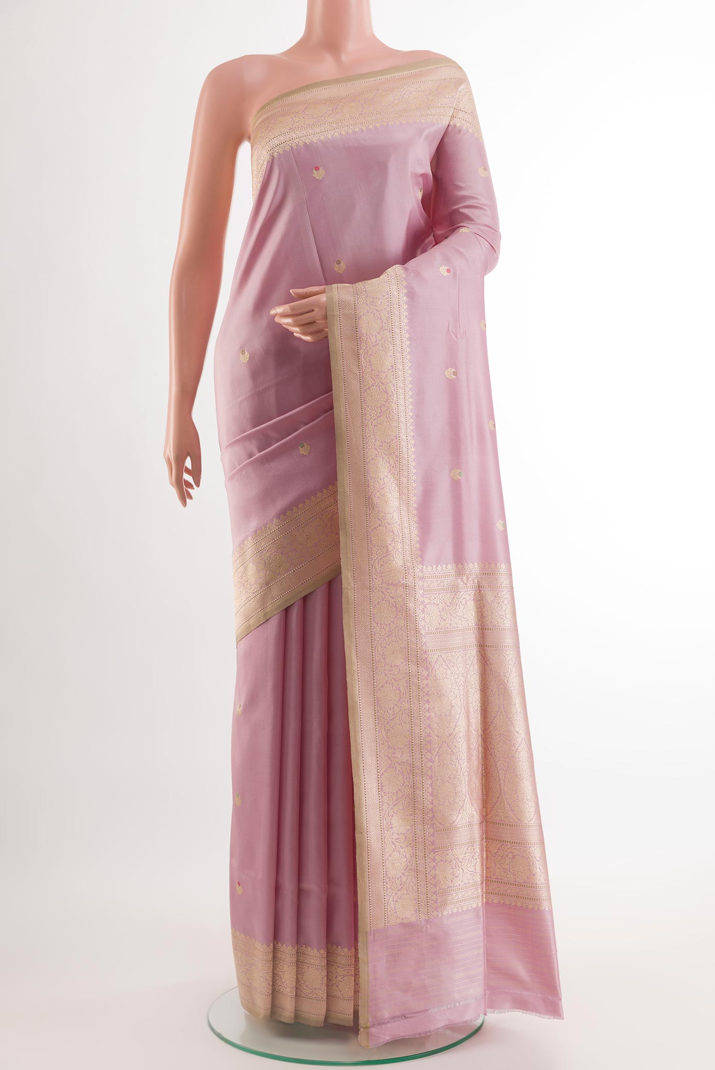 Lavender Banarasi Silk Saree with Zari Butta on the body and Zari Border.  displayed on a mannequin