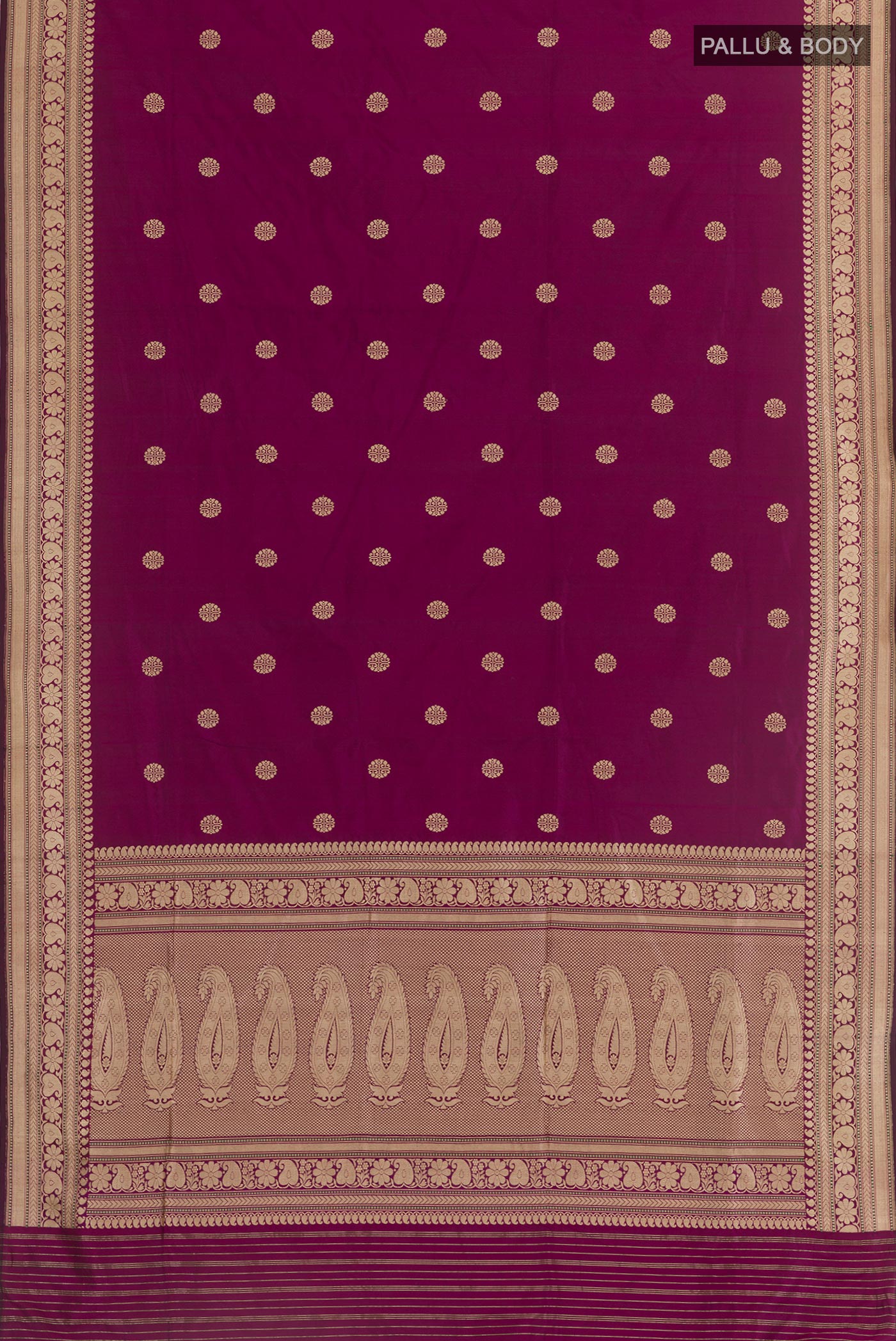 Flat view of Purple Banarasi Silk Saree with Zari Butta on the body and Zari Border. 