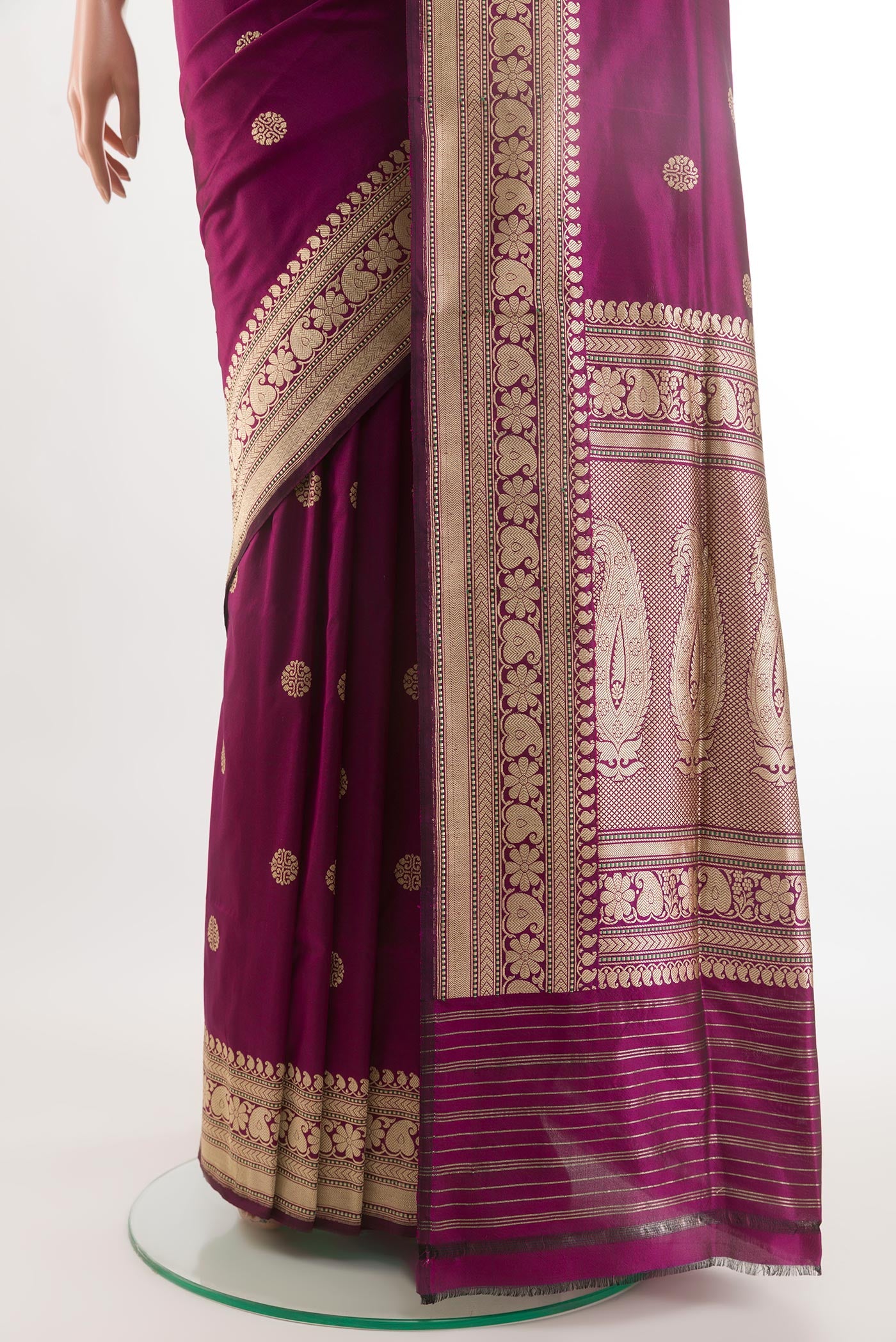 Pleats and pallu of Purple Banarasi Silk Saree with Zari Butta on the body and Zari Border. 