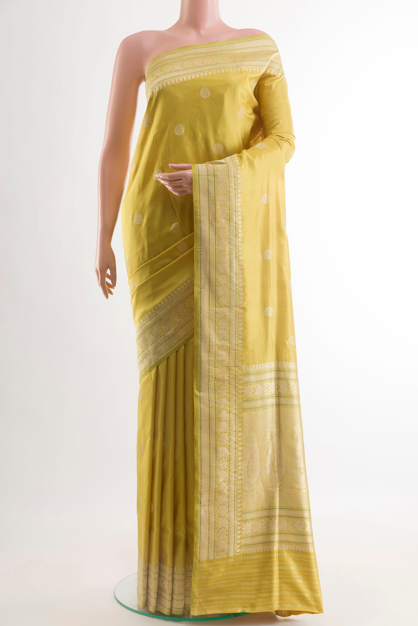 Lemon Yellow Banarasi Silk Saree with Zari Butta on the body and Zari Border.  displayed on a mannequin