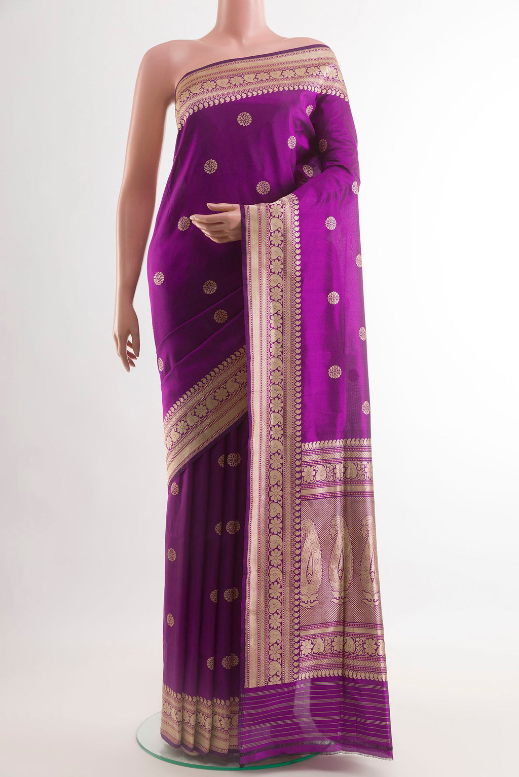 Purple Banarasi Silk Saree with Zari Butta on the body and Zari Border.  displayed on a mannequin