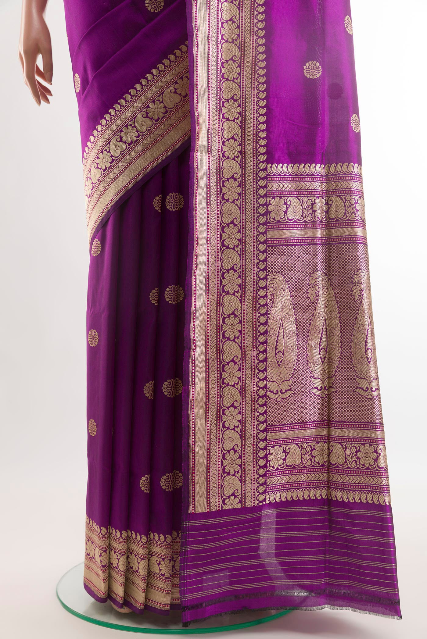 Pleats and pallu of Purple Banarasi Silk Saree with Zari Butta on the body and Zari Border. 