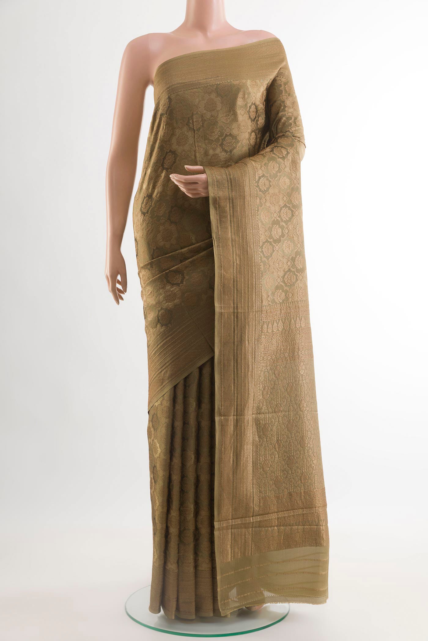 Beige Mysore Crepe Saree with Zari Brocade on the body and Zari Border.  displayed on a mannequin