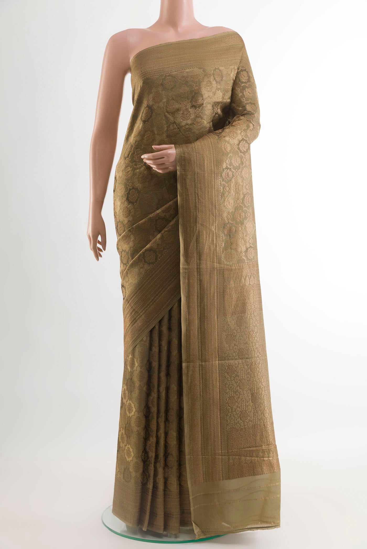 Beige Mysore Crepe Saree with Zari Brocade on the body and Zari Border.  displayed on a mannequin
