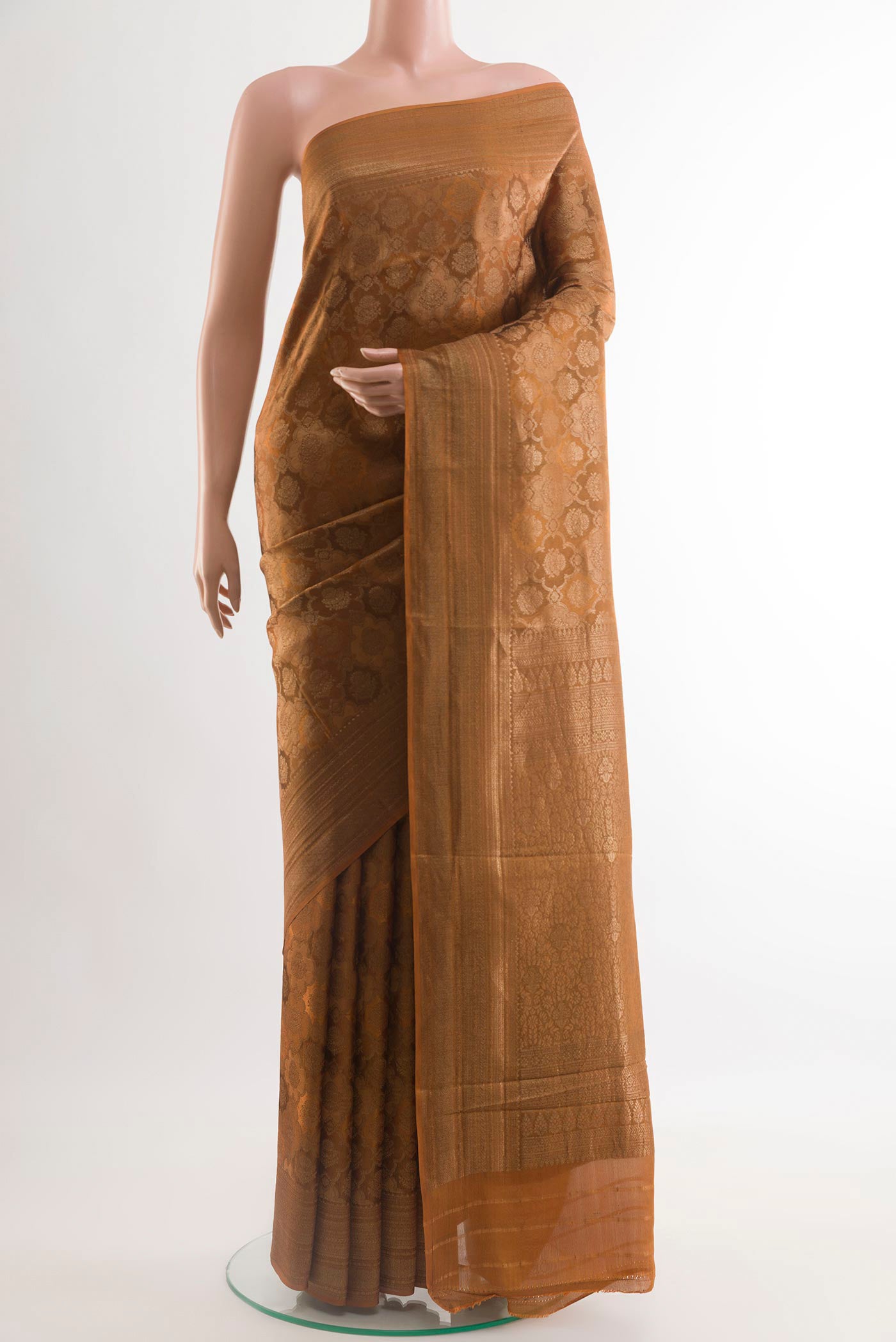Mustard Mysore Crepe Saree with Zari Brocade on the body and Zari Border.  displayed on a mannequin