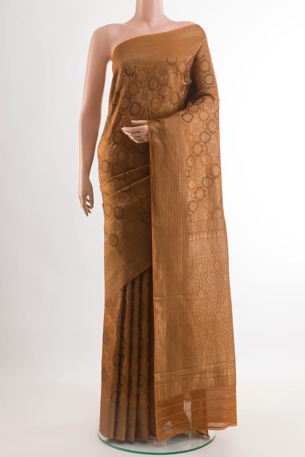 Brown Mysore Crepe Saree with Zari Brocade on the body and Zari Border.  displayed on a mannequin