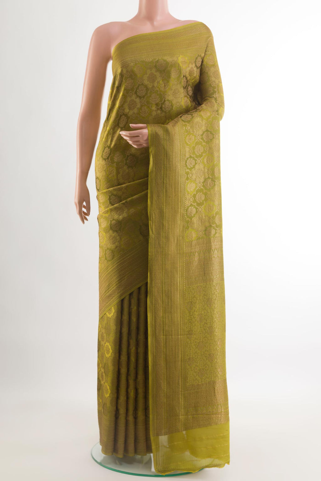 Mehandi Green Mysore Crepe Saree with Zari Brocade on the body and Zari Border.  displayed on a mannequin