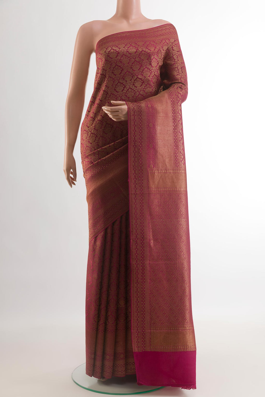 Pink Mysore Crepe Saree with Zari Brocade on the body and Zari Border.  displayed on a mannequin