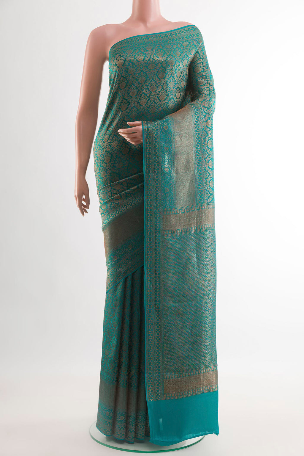 Blue Mysore Crepe Saree with Zari Brocade on the body and Zari Border.  displayed on a mannequin