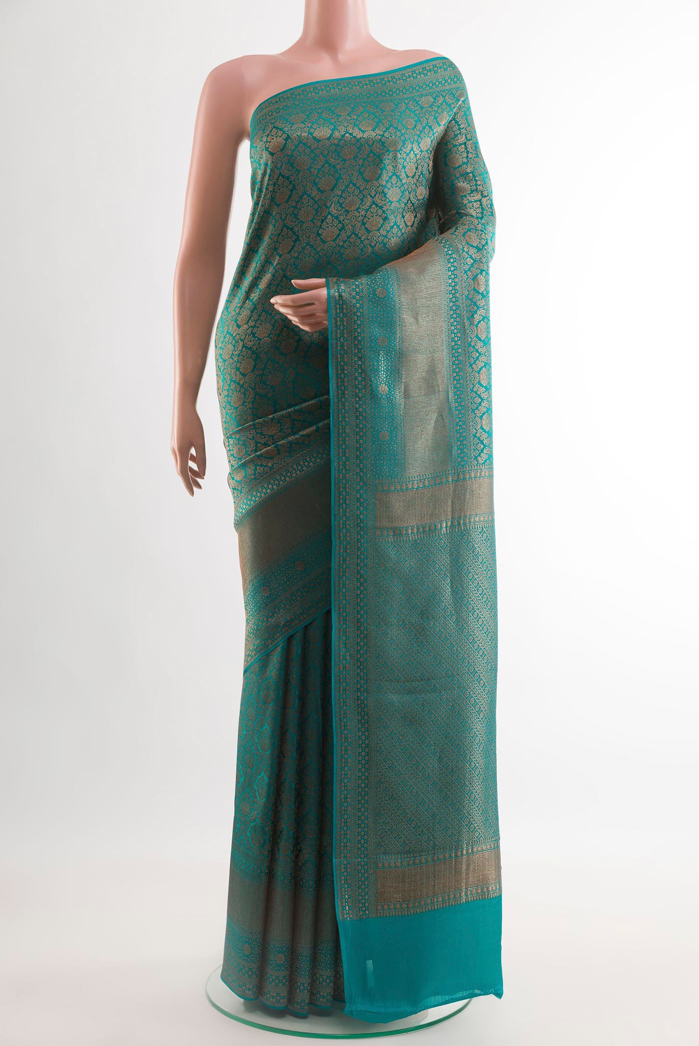 Blue Mysore Crepe Saree with Zari Brocade on the body and Zari Border.  displayed on a mannequin