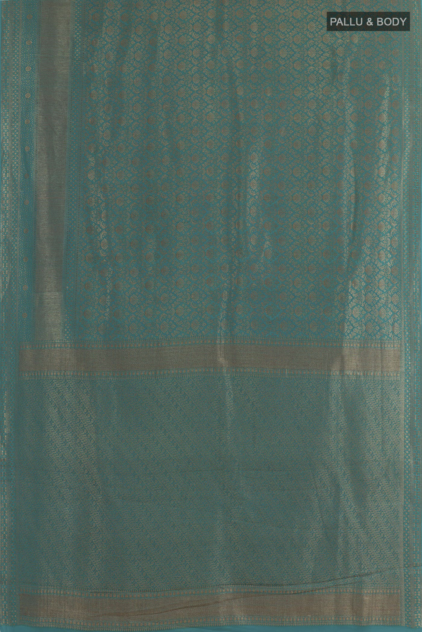Flat view of Blue Mysore Crepe Saree with Zari Brocade on the body and Zari Border. 