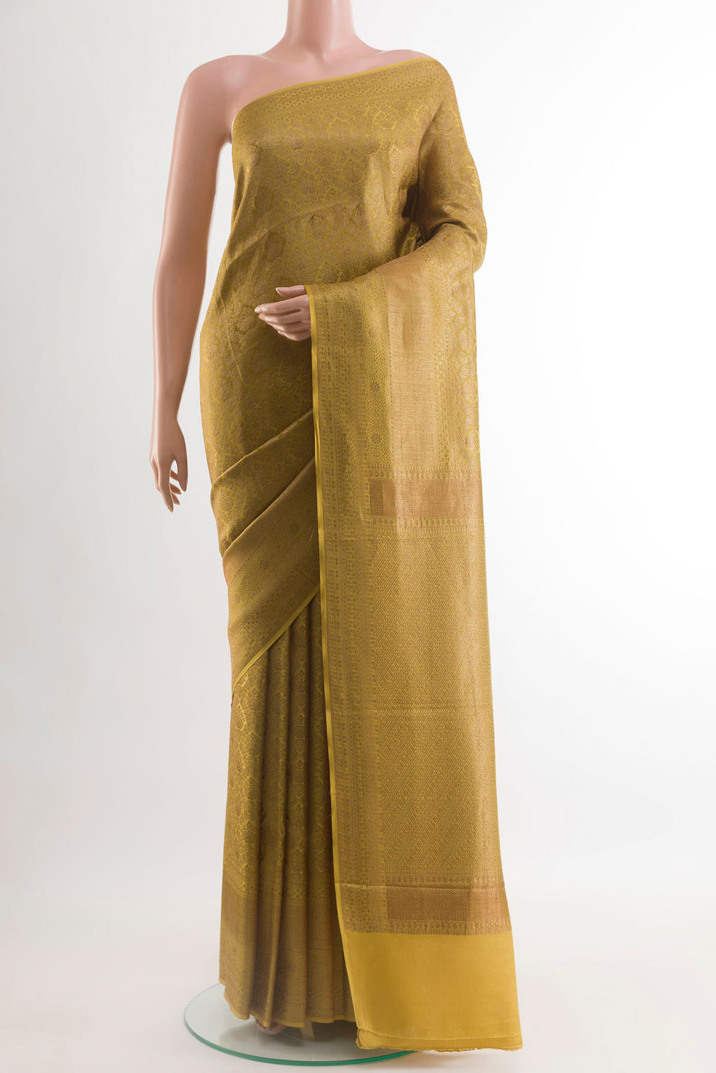 Yellow Mysore Crepe Saree with Zari Brocade on the body and Zari Border.  displayed on a mannequin