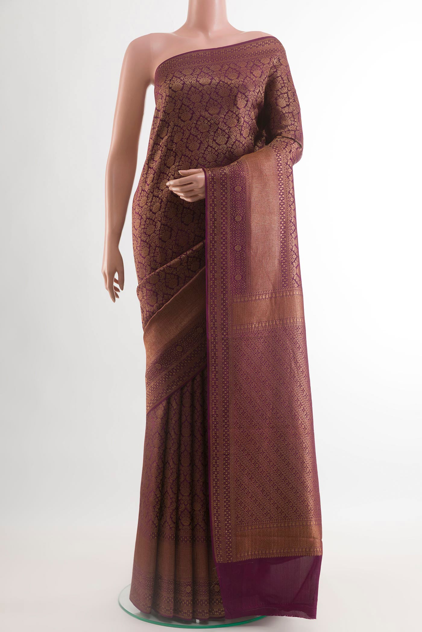 Purple Mysore Crepe Saree with Zari Brocade on the body and Zari Border.  displayed on a mannequin
