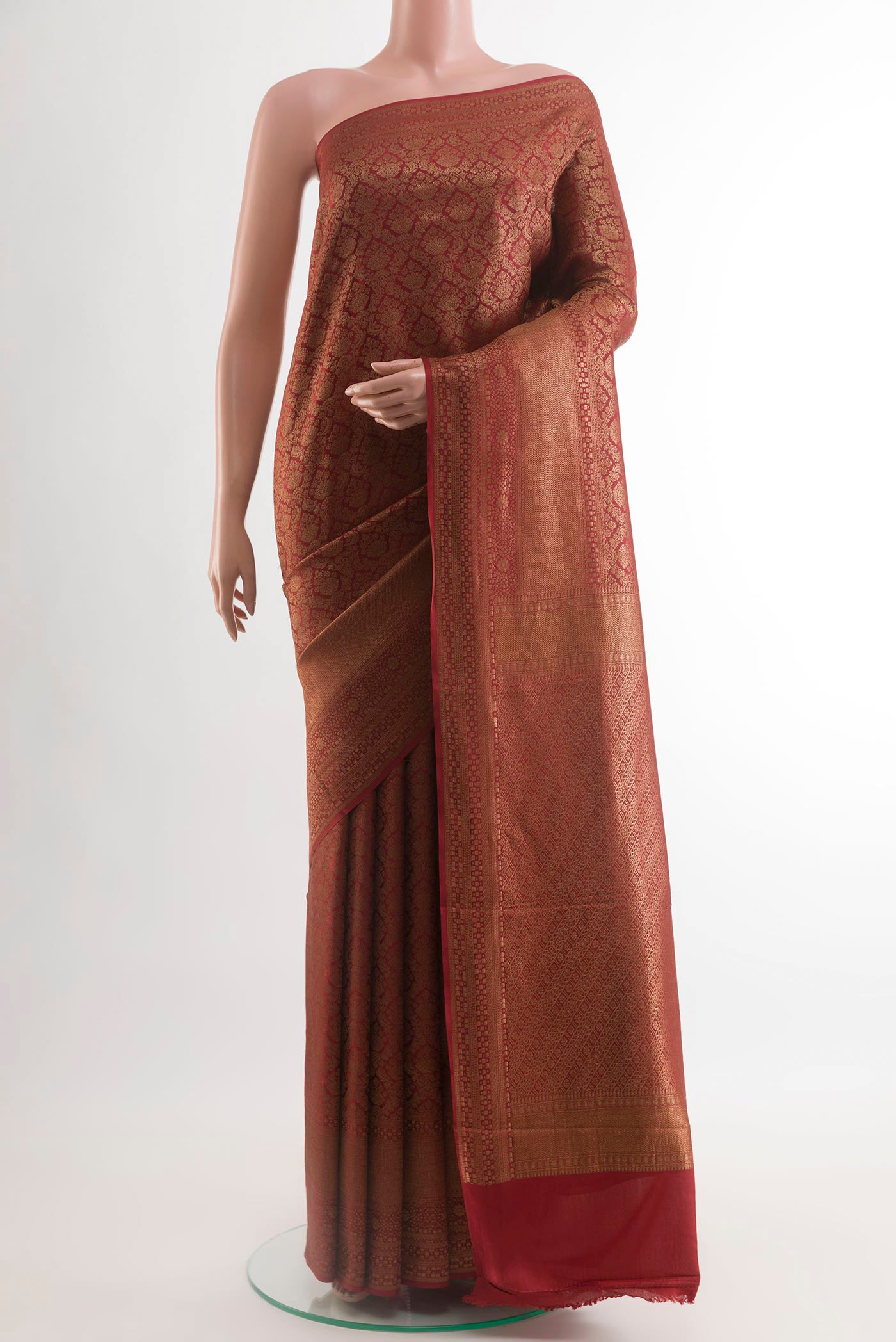 Green Mysore Crepe Saree with Zari Brocade on the body and Zari Border.  displayed on a mannequin
