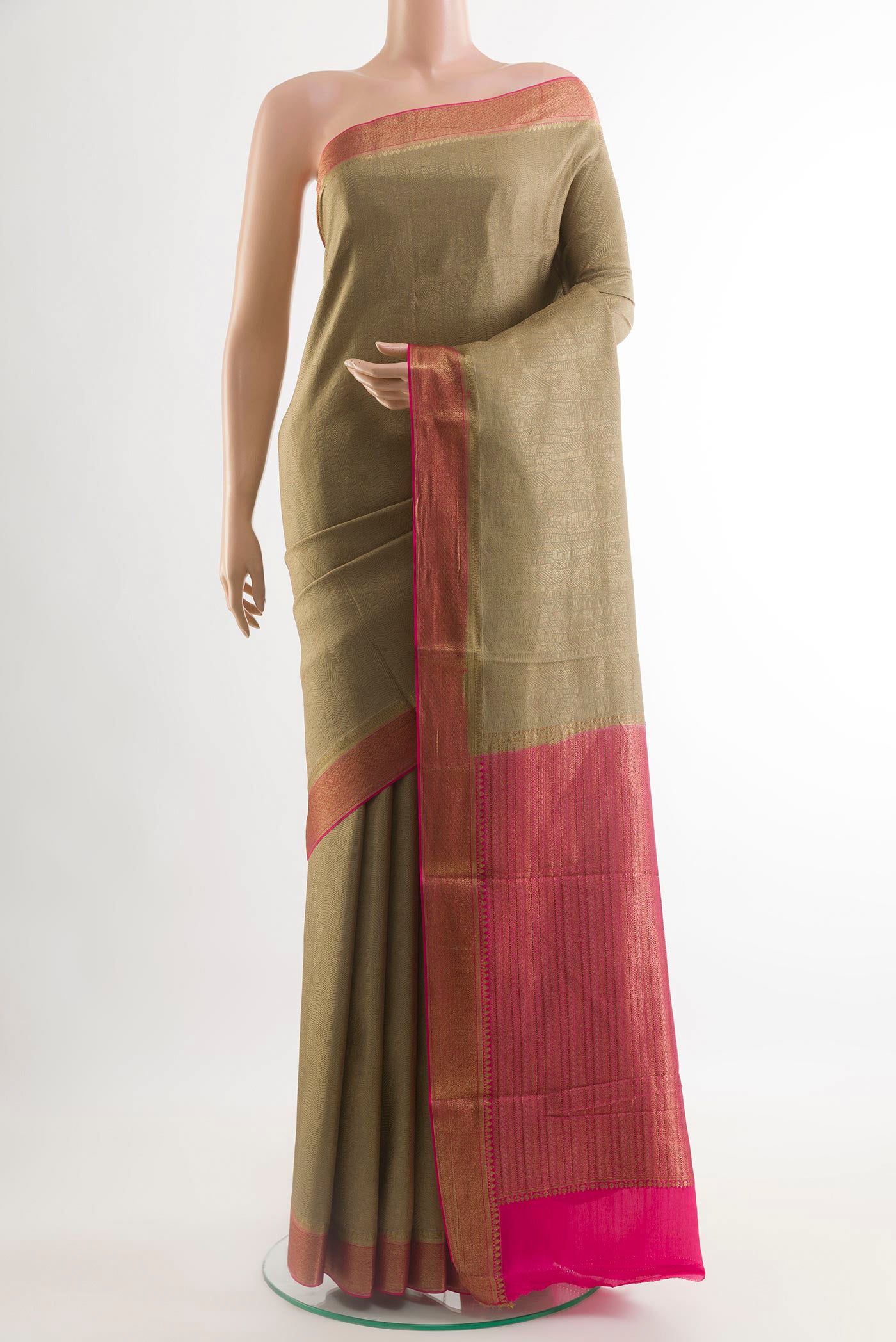 Beige Mysore Crepe Saree with Zari Brocade on the body and Zari Border.  displayed on a mannequin