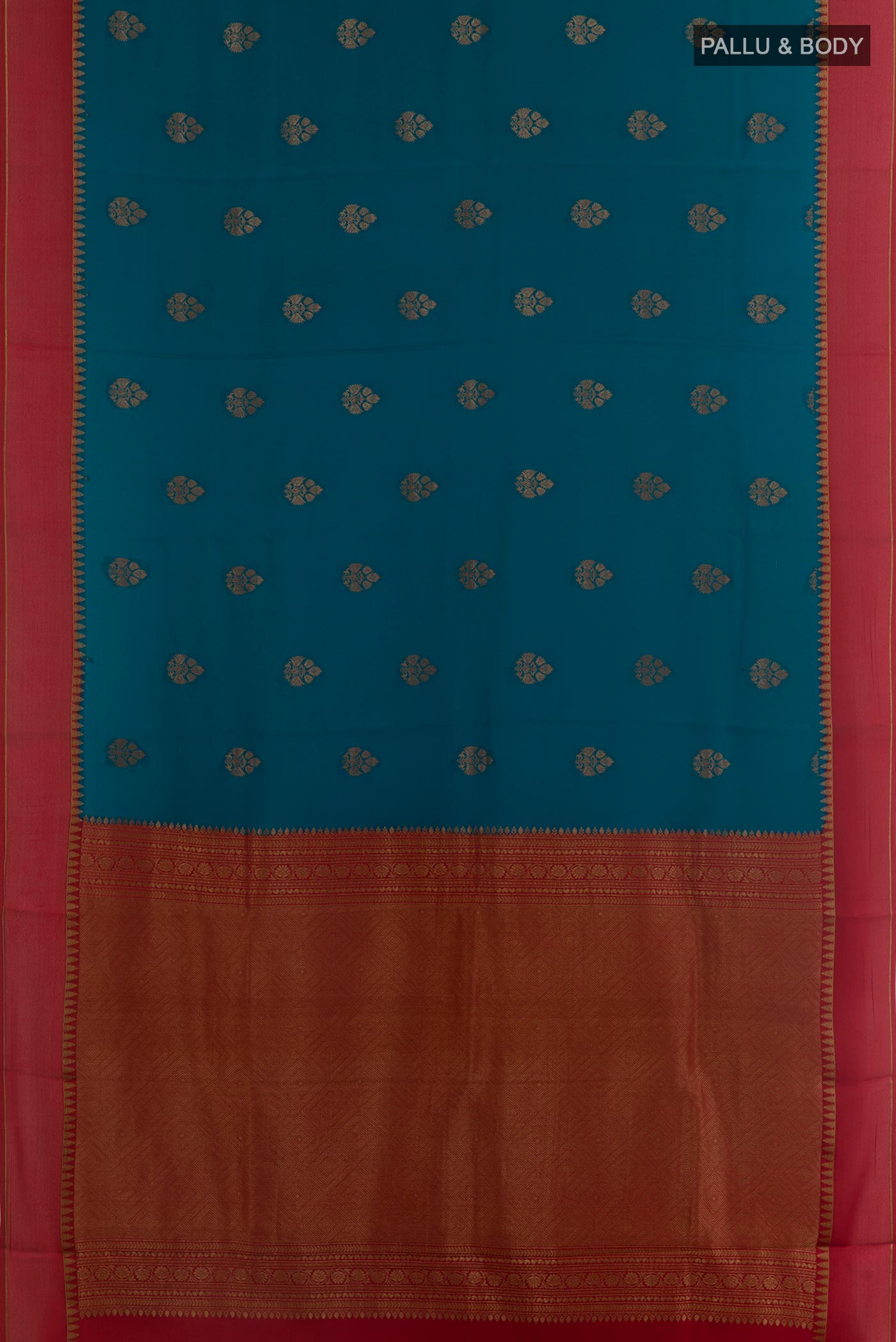 Flat view of Blue Mysore Crepe Saree with Zari Butta on the body and Plain Border. 