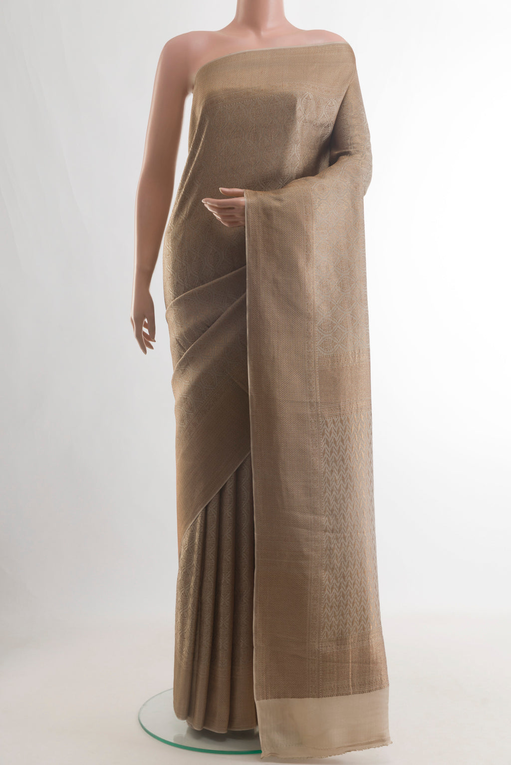 Grey Mysore Crepe Saree with Zari Brocade on the body and Zari Border.  displayed on a mannequin