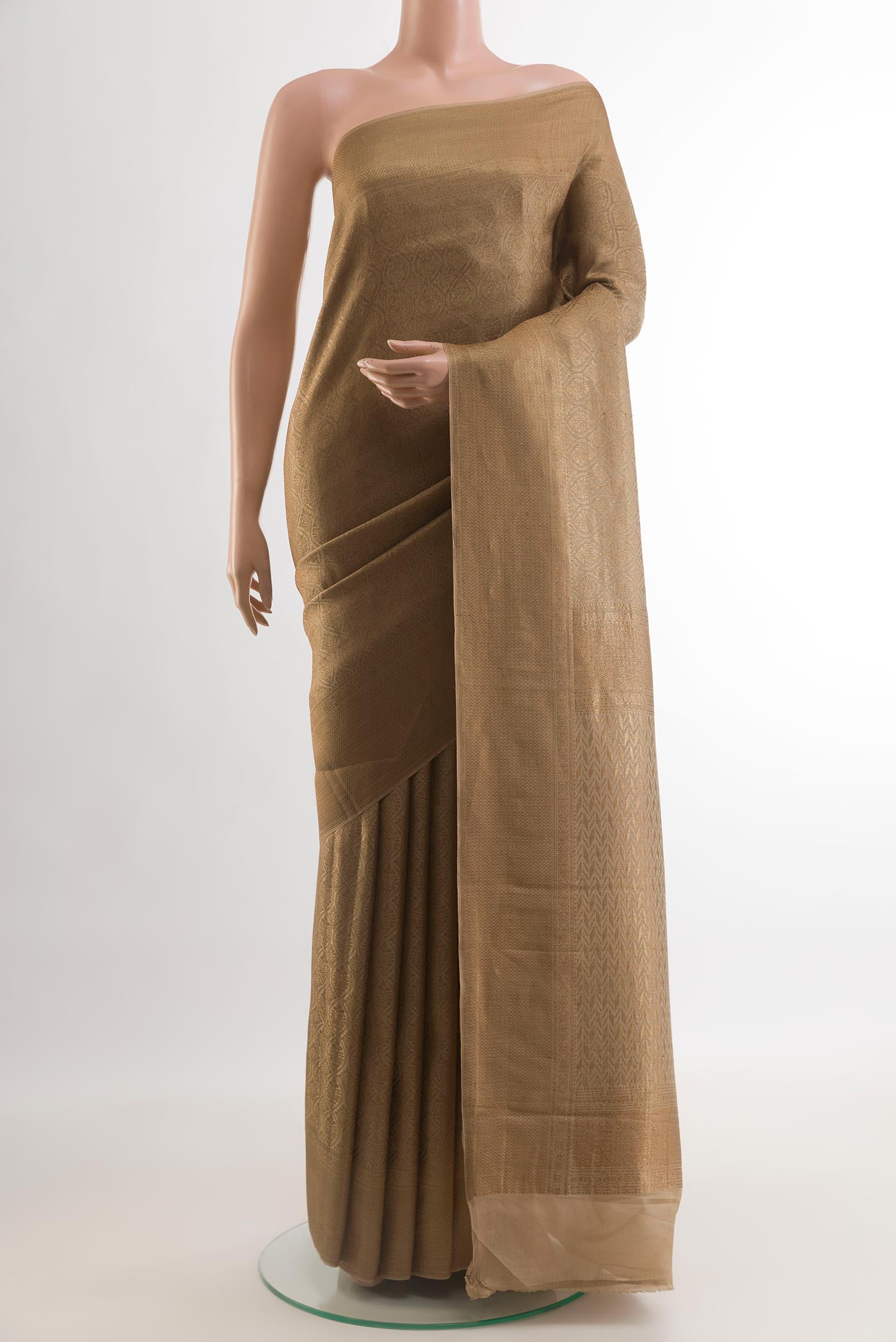 Dark Beige Mysore Crepe Saree with Zari Brocade on the body and Zari Border.  displayed on a mannequin