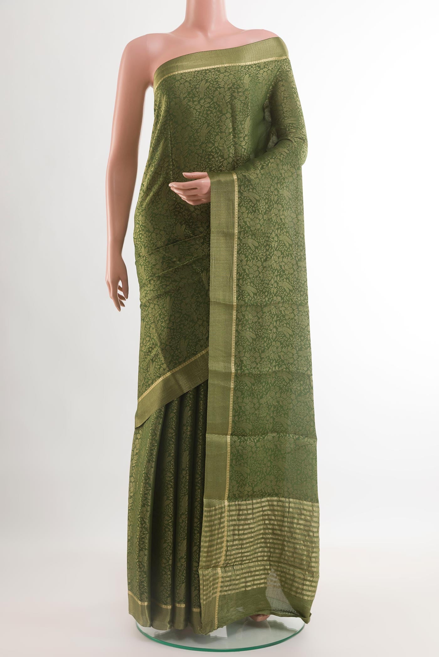 Mehandi Green Mysore Crepe Saree with Zari Brocade on the body and Zari Border.  displayed on a mannequin