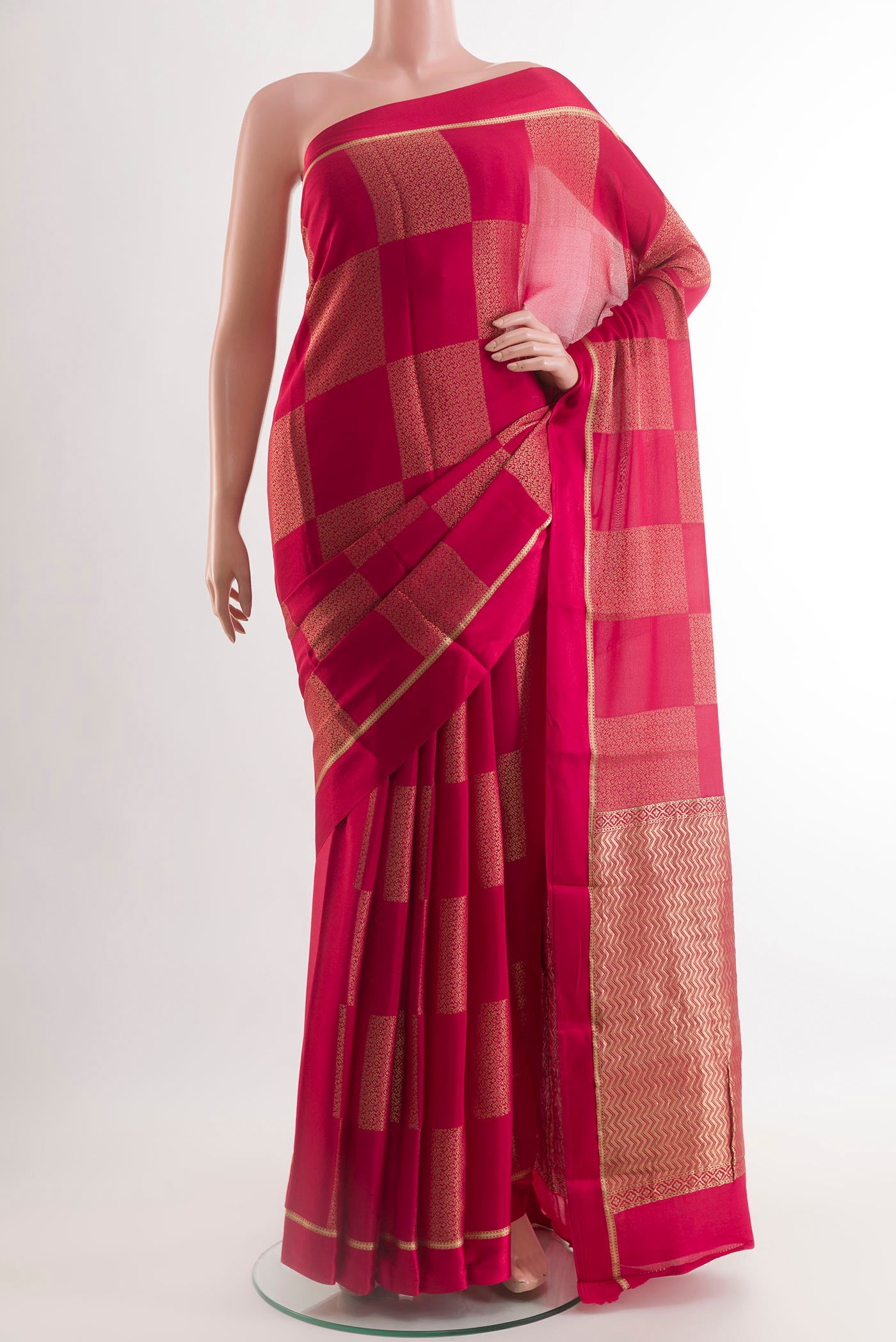 Pink Mysore Crepe Saree with Zari Butta on the body and Zari Border.  displayed on a mannequin