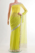 Light Green Mysore Chiffon Saree with Embroidery on the body and Zari Border.  displayed on a mannequin
