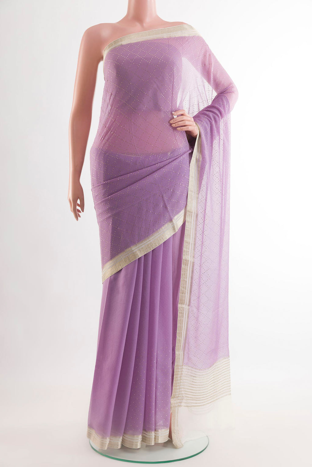 Lavender Mysore Chiffon Saree with Embroidery on the body and Zari Border.  displayed on a mannequin