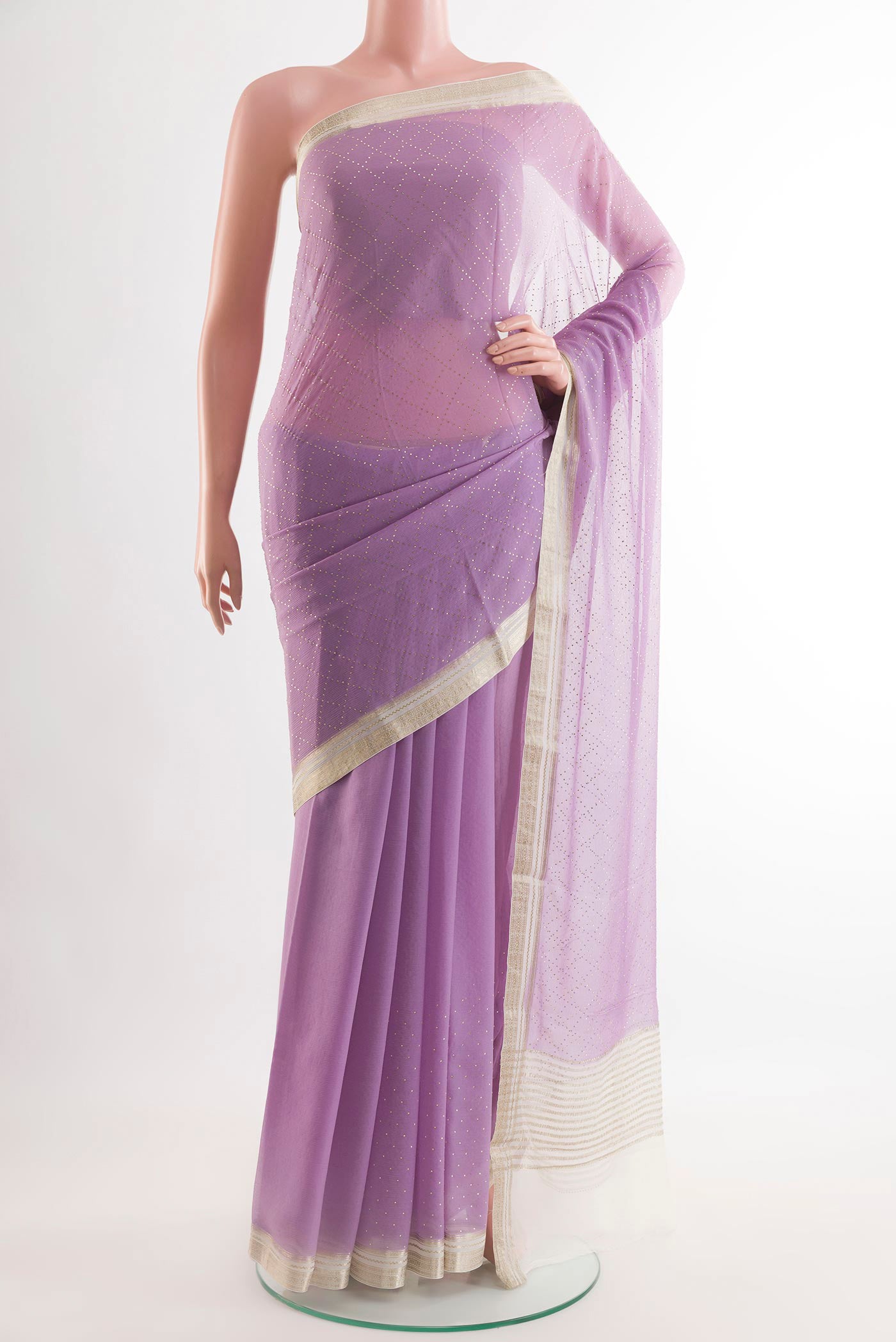 Lavender Mysore Chiffon Saree with Embroidery on the body and Zari Border.  displayed on a mannequin