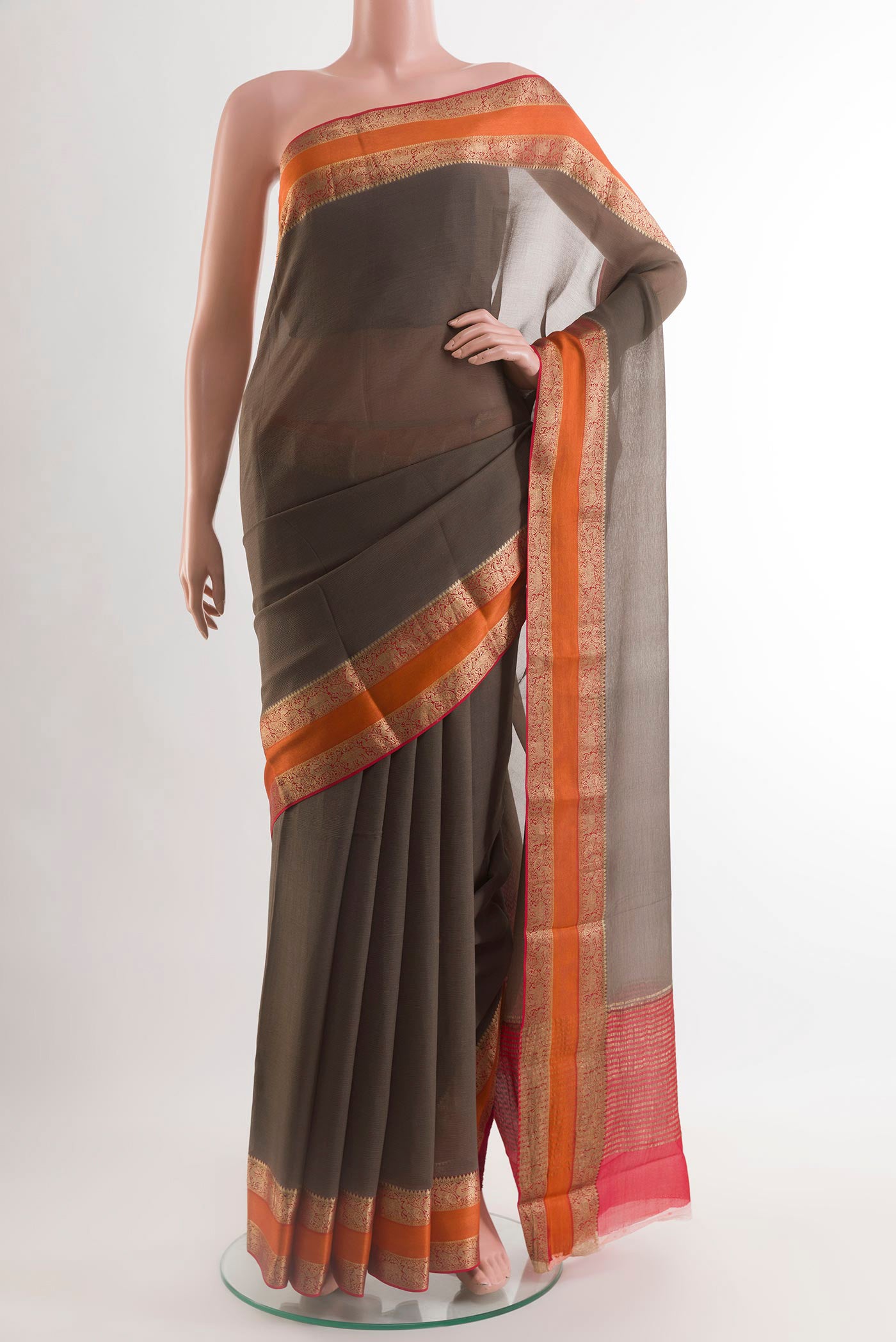 Grey Mysore Chiffon Saree with Plain Body and Zari Border.  displayed on a mannequin