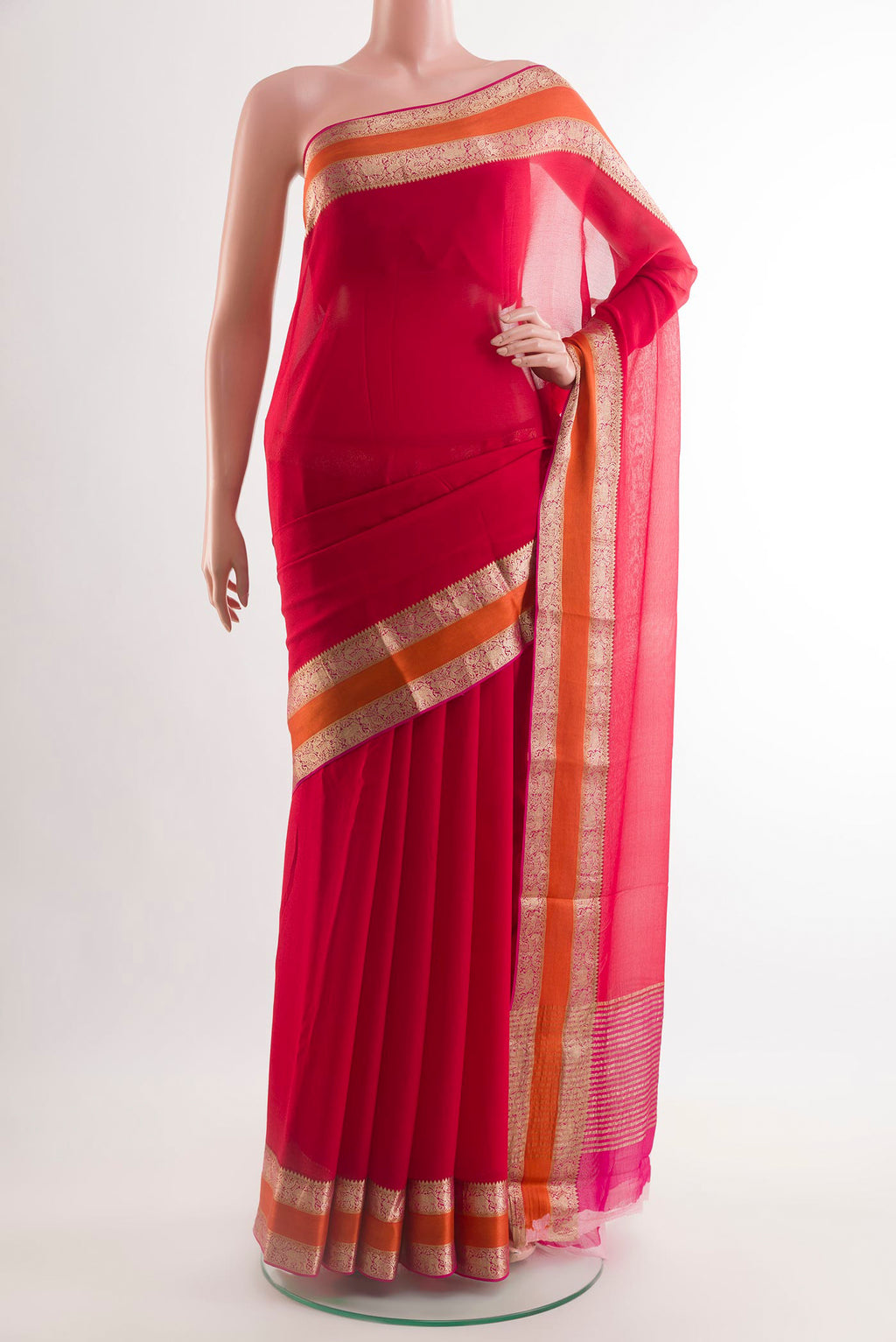 Red Mysore Chiffon Saree with Plain Body and Zari Border.  displayed on a mannequin