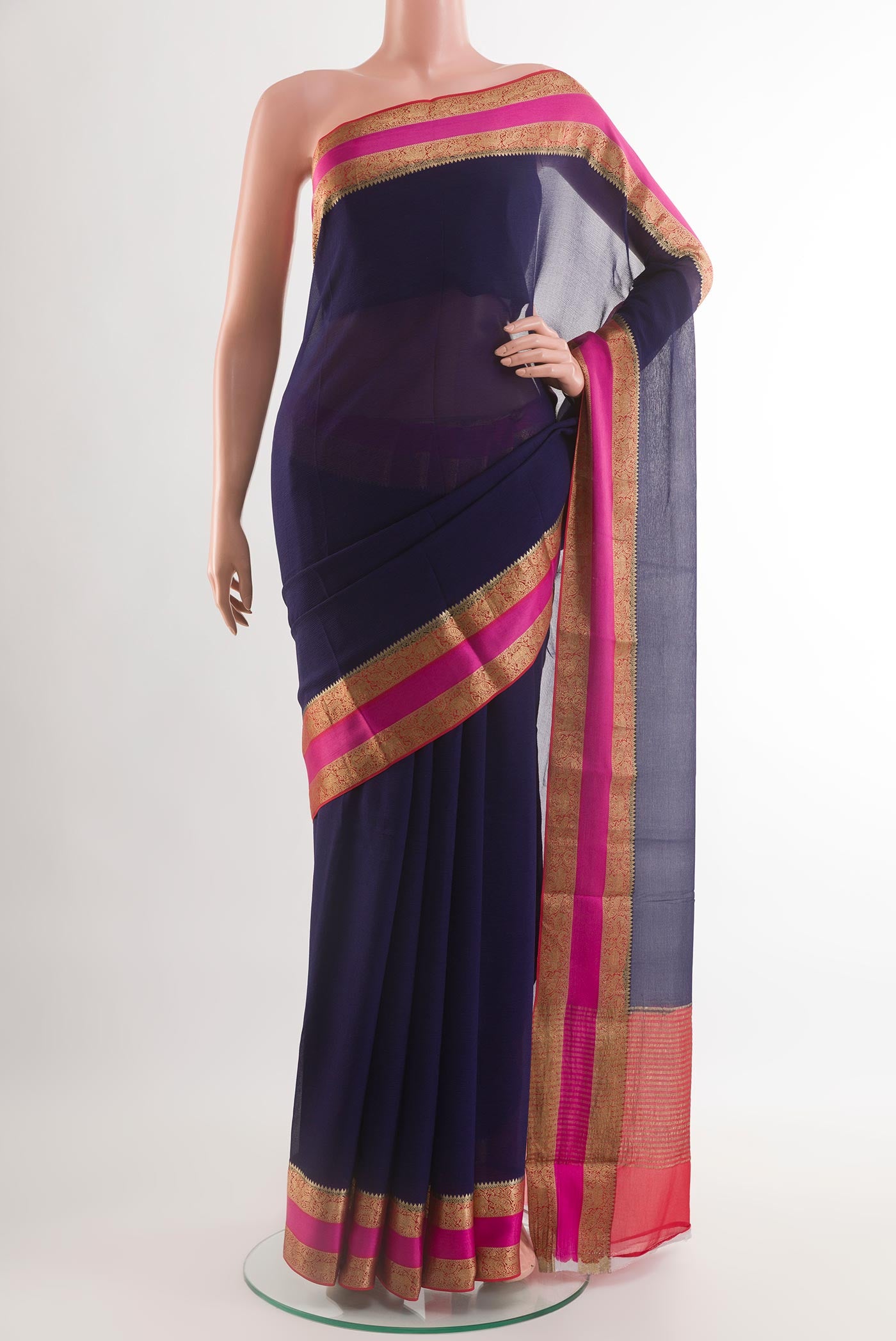 Dark Blue Chiffon Saree with Plain Body and Plain Border.  displayed on a mannequin