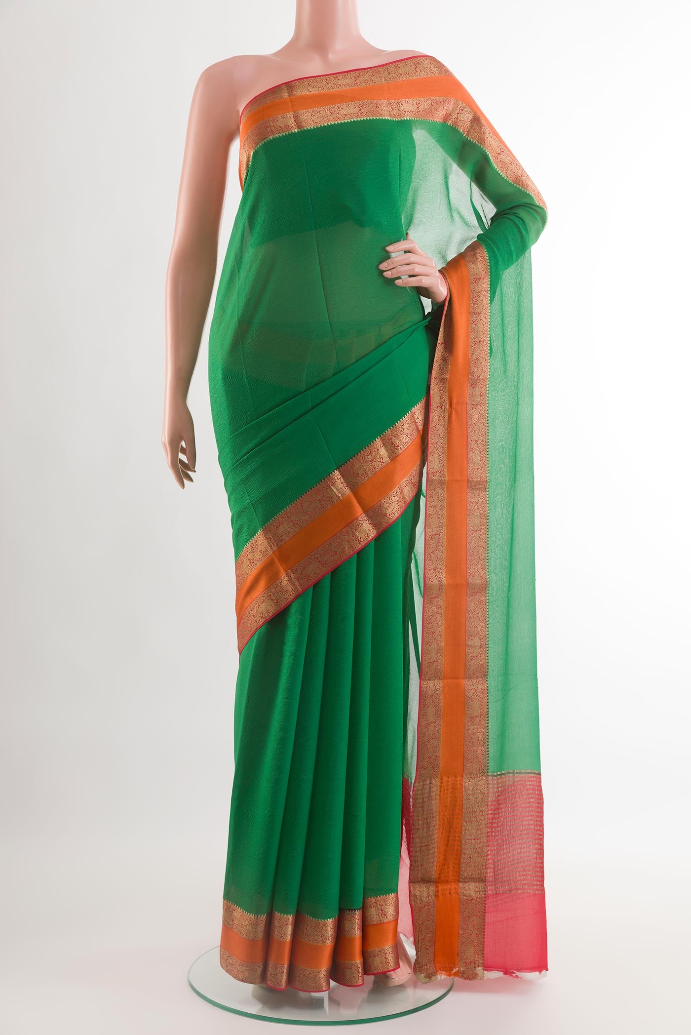 Green Chiffon Saree with Plain Body and Plain Border.  displayed on a mannequin