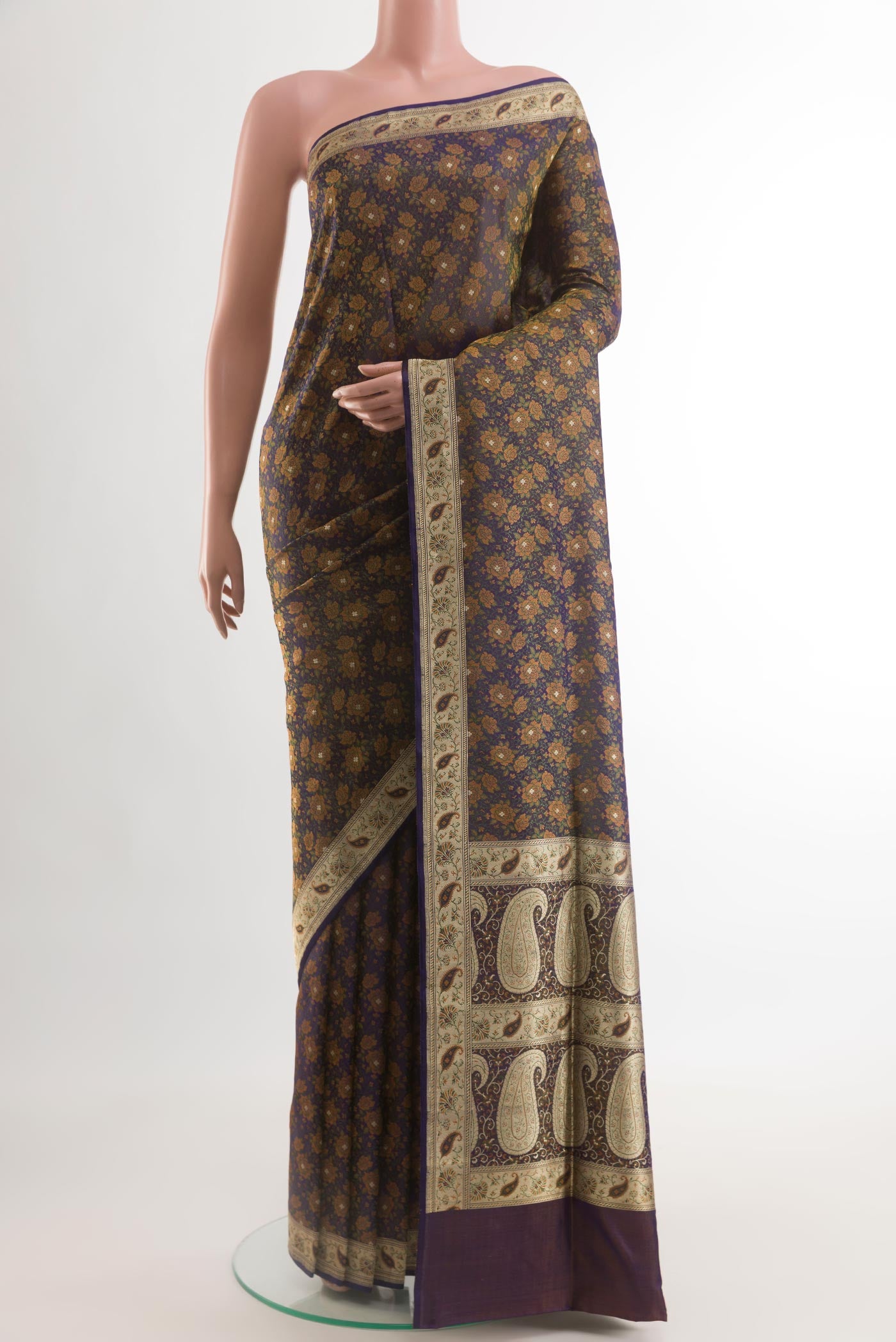 Dark Blue Banarasi Tanchoi Silk Saree with Jacquard With Zari Butta on the body and Zari Border.  displayed on a mannequin
