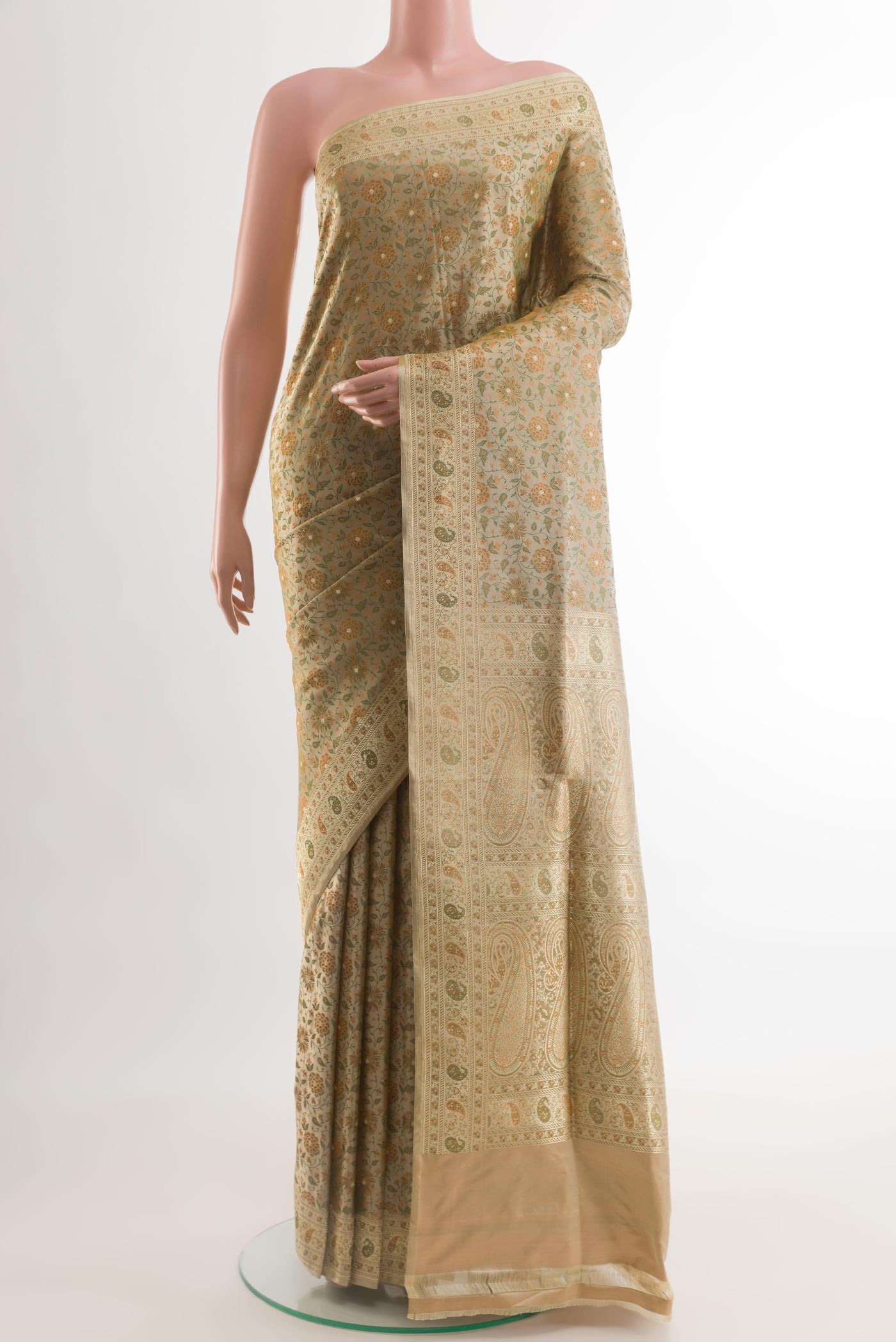 Beige Banarasi Tanchoi Silk Saree with Jacquard With Zari Butta on the body and Zari Border.  displayed on a mannequin