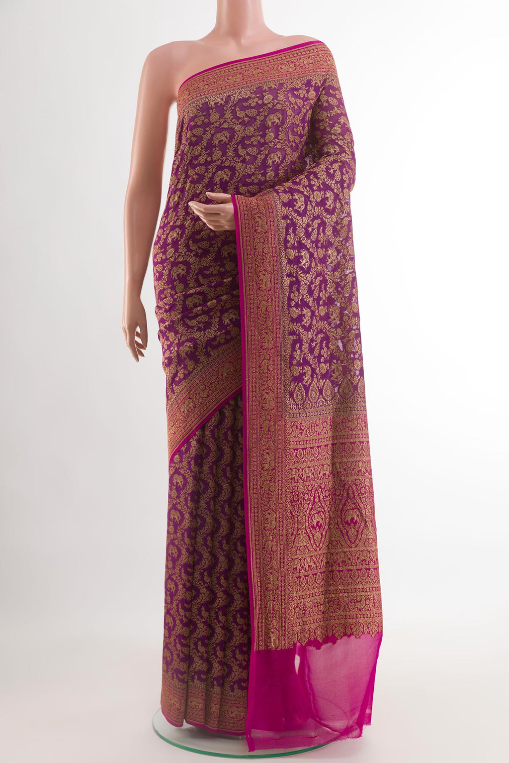 Purple Banarasi Georgette Saree with Zari Brocade on the body and Zari Border.  displayed on a mannequin