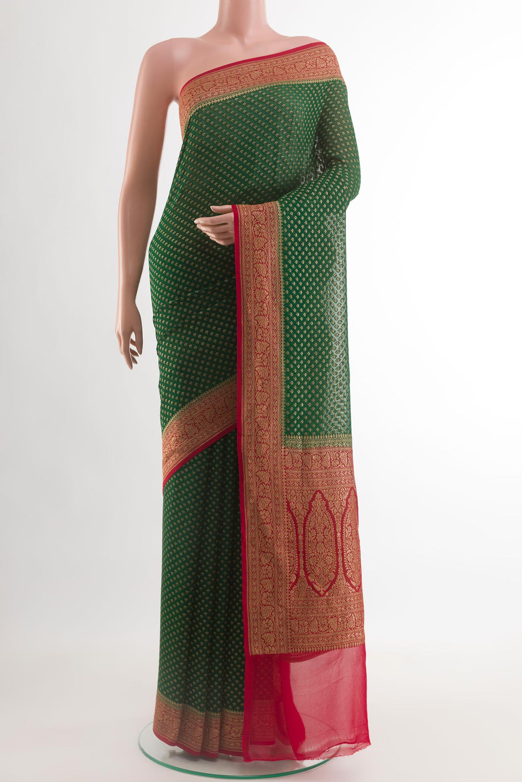 Green Banarasi Georgette Saree with Zari Butta on the body and Zari Border.  displayed on a mannequin