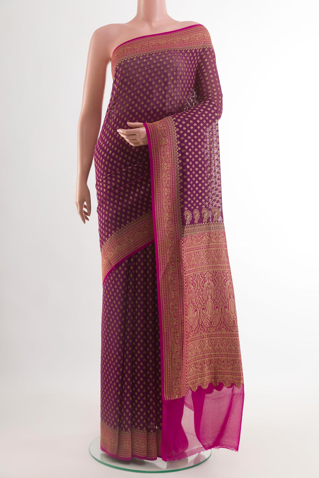 Purple Banarasi Georgette Saree with Zari Butta on the body and Zari Border.  displayed on a mannequin