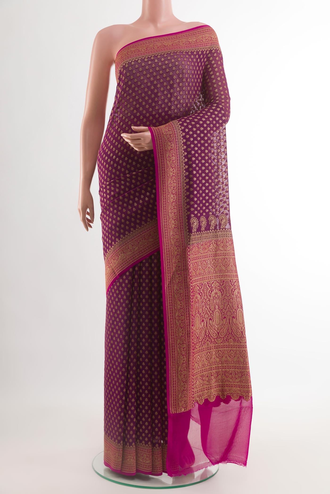 Purple Banarasi Georgette Saree with Zari Butta on the body and Zari Border.  displayed on a mannequin