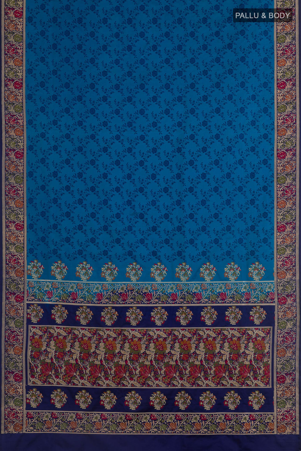 Flat view of Blue Banarasi Tanchoi Silk Saree with Jacquard design on the body and Zari And Thread Border. 
