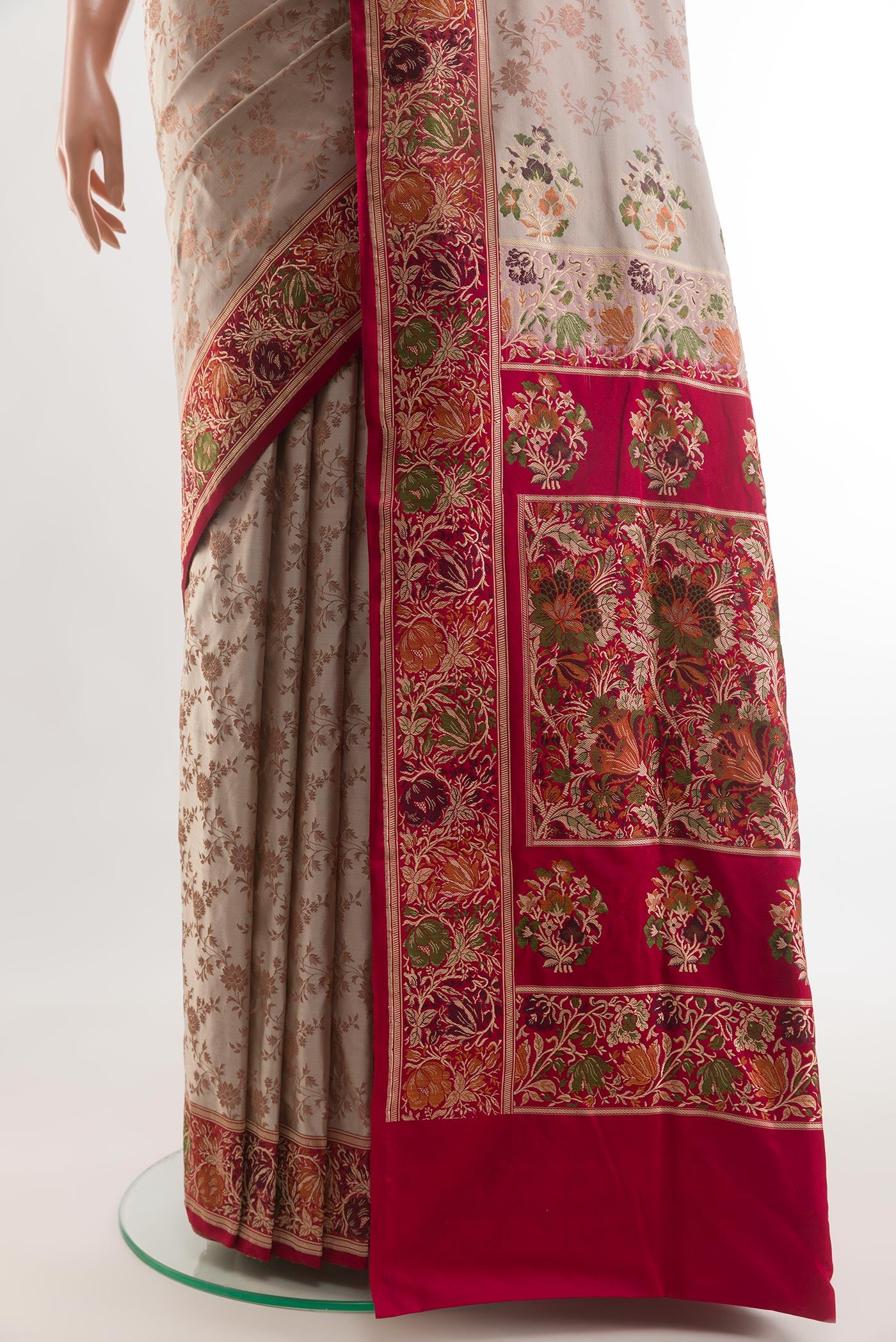 Pleats and pallu of Beige Banarasi Tanchoi Silk Saree with Jacquard design on the body and Zari Border. 