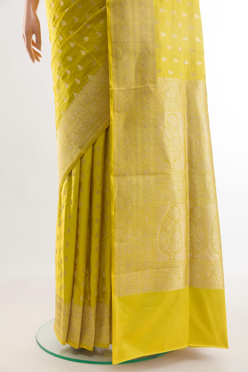 Pleats and pallu of Yellow Banarasi Silk Saree with Zari Butta on the body and Zari Border. 