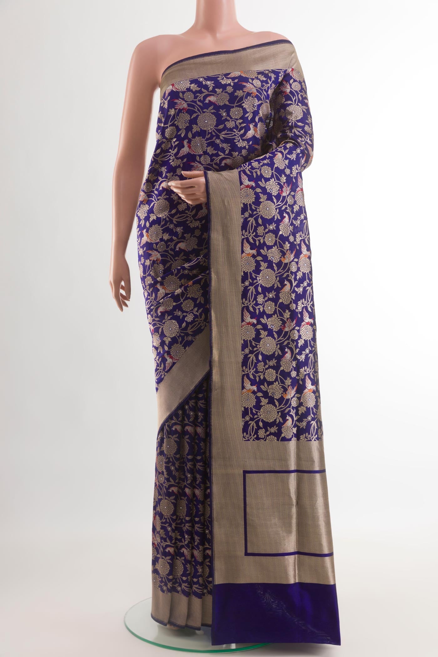 Dark Blue Banarasi Silk Saree with Zari Brocade on the body and Zari Border.  displayed on a mannequin