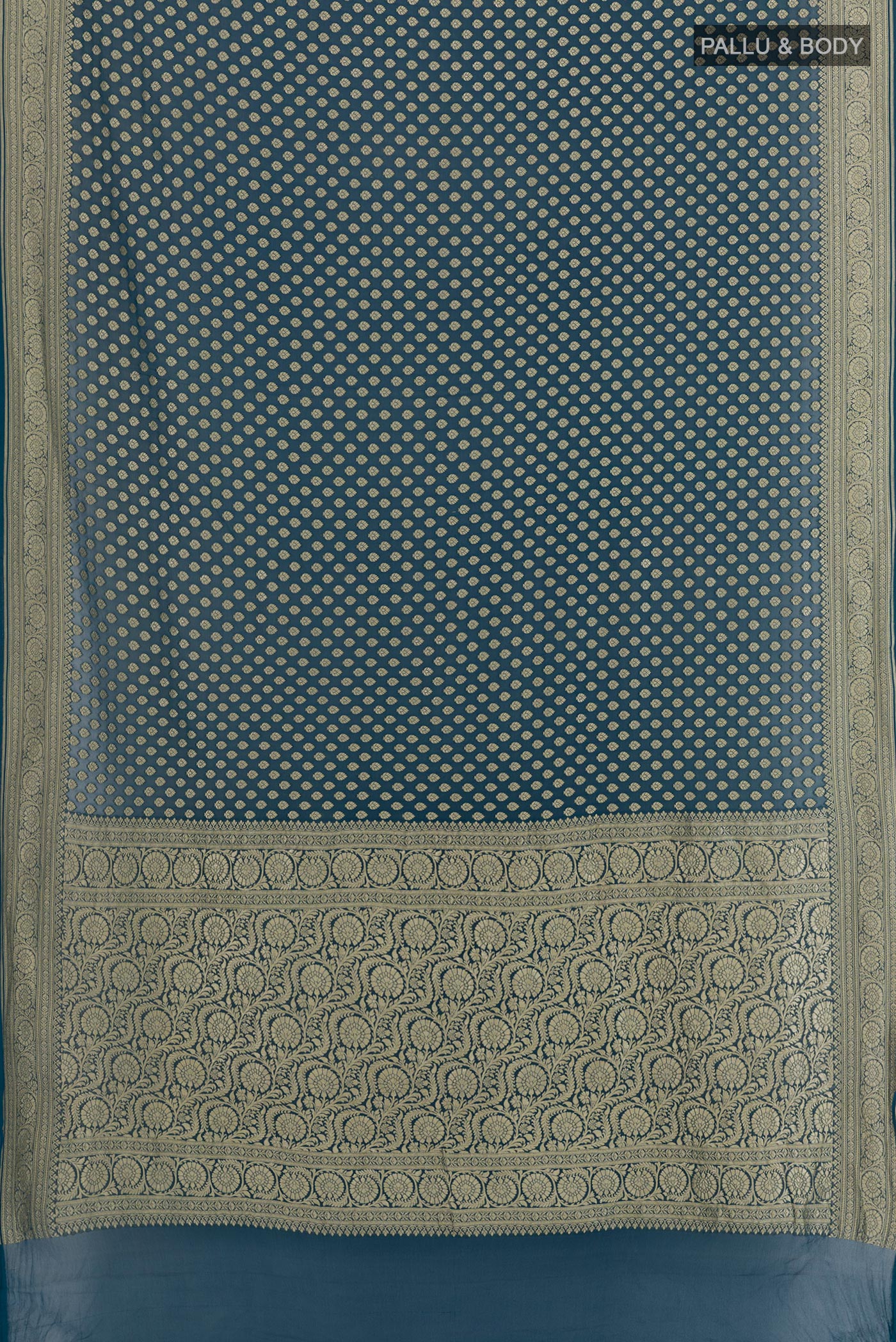 Flat view of Dark Blue Banarasi Georgette Saree with Zari Butta on the body and Zari Border. 
